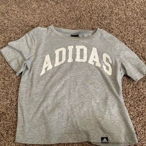 An Adidas crop top.